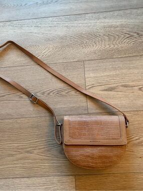Tan embossed burkely crossbody bag